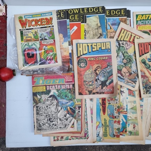 166 - A very large collection of vintage comics and magazines including editions of 'The Beezer' and a num... 