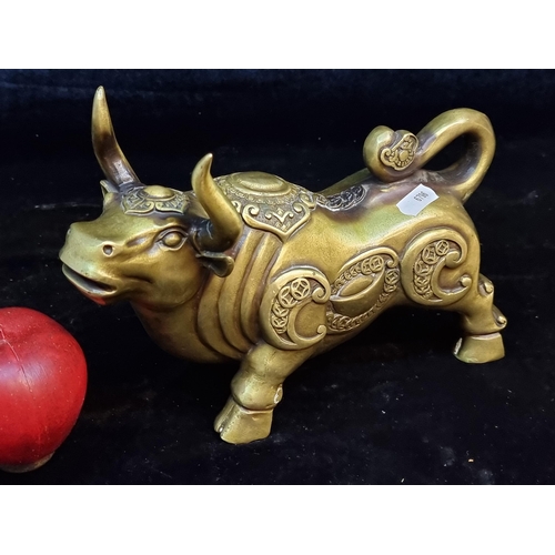 181 - A very heavy brass bull figure cast to celebrate the Chinese Year of the Metal Ox in the zodiac cale... 