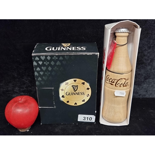 310 - Two branded items including a Guinness Draught Poker Kit in original packaging, along with a Coca-Co... 