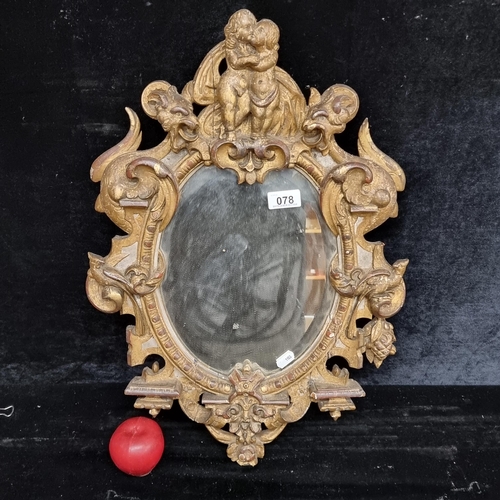 78 - Star Lot : A stunning original George III (1738-1820) antique oval mirror with ornate wooden frame b... 