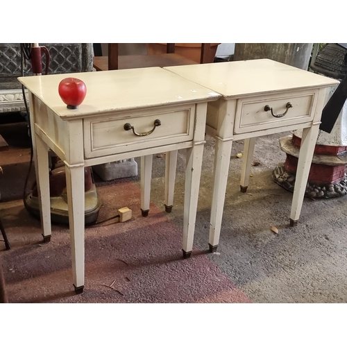 967 - A pair of charming bedside tables in a fashionable shabby chic style. Featuring a single drawer with... 