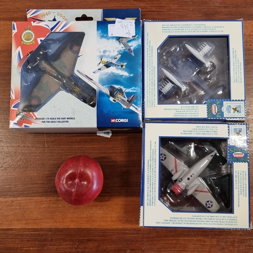 975 - Three brand new collectable model planes. Including a model plane by Corgi Models as part of the The... 