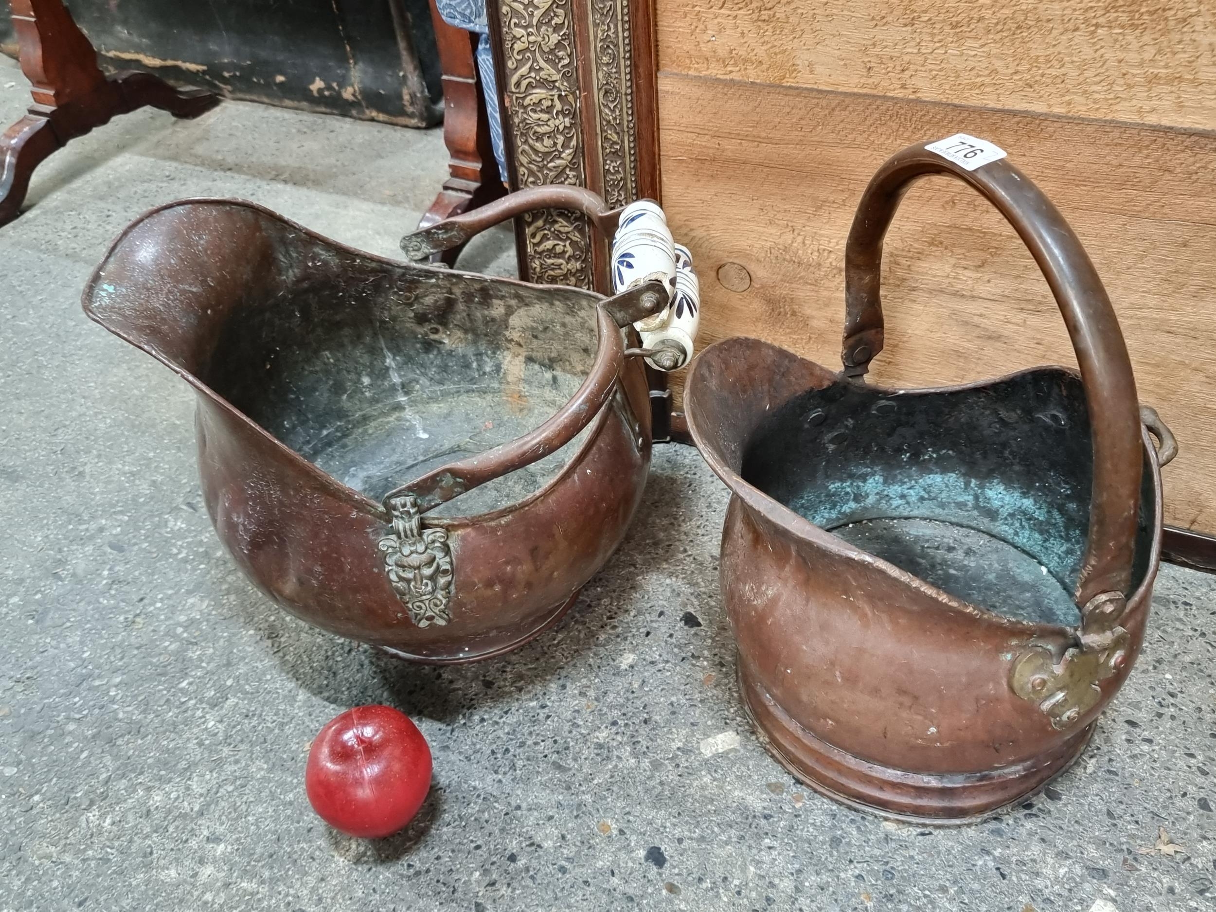 Two vintage copper coal buckets / coal scuttles in the helmet style