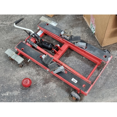 A Very Heavy Sealey Hydraulic Scissor Motorcycle Lift Set On Wheels