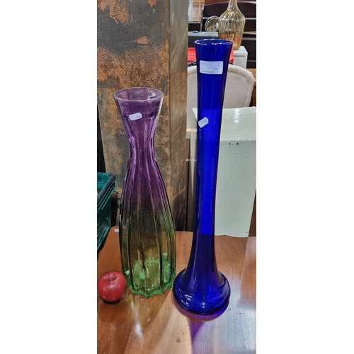 925 - Two art glass vases including a Spanish made duo-chrome lime green and lilac facet cut example, and ... 