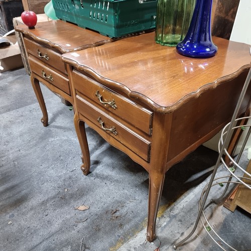 926 - Two bedside tables with serpentine edge, cabriole legs and two drawers to front with brass toned pul... 