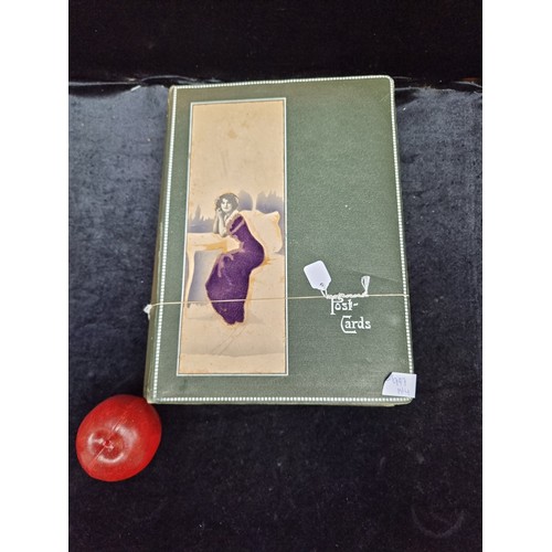 997 - Star Lot : An original Art Nouveau post card album with 340 collectible postcards dating to WWI feat... 