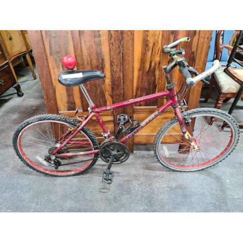 979 - A Raleigh Avalanche bicycle with shimano gears. In a red finish.