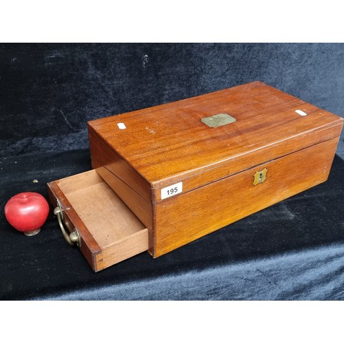 195 - An Edwardian travel writing slope. Featuring neat drawers and storage cubbies for display of inkwell... 