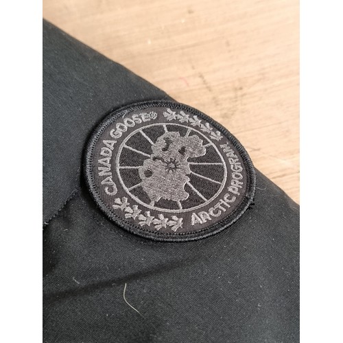 A men's designer padded jacket by sought after brand Canada Goose