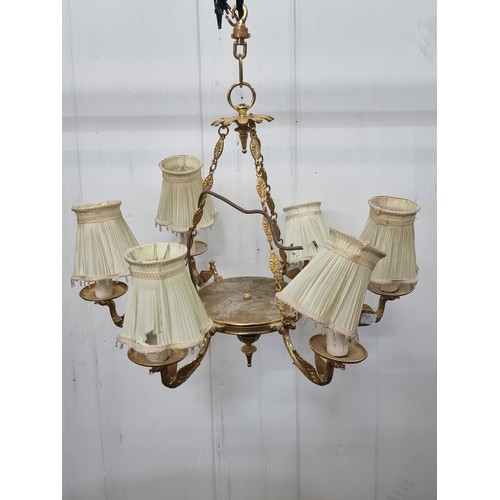 989 - A beautiful brass toned chandelier with six branches in the form of exotic birds topped with neatly ... 