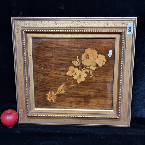 100 - A really nice piece of marquetry featuring various types of wood creating a floral arrangement. Hous... 