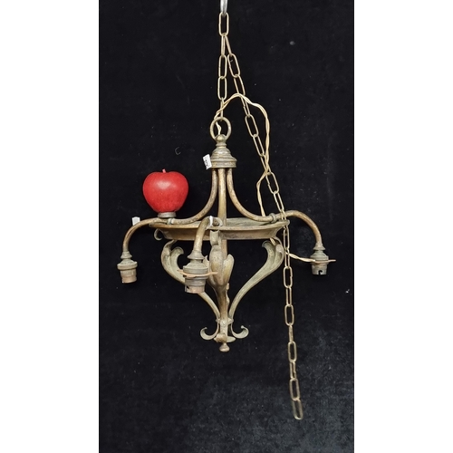123 - A striking antique brass, Art Nouveau ceiling light fitting with three branches. Boasts simple yet e... 