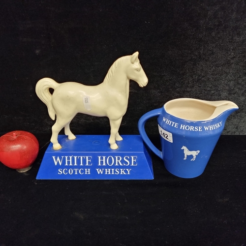 142 - Two super original  advertising White Horse Scotch Whisky including a ceramic jug in a blue glaze ma... 
