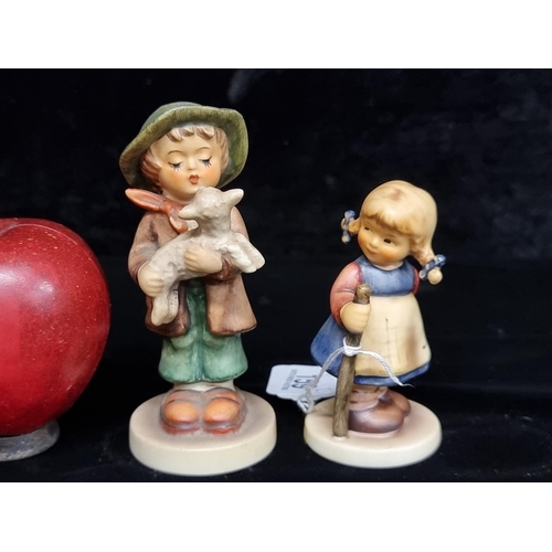 159 - Two precious vintage West German Goebel for Hummel figures including one titled 'Pixie' and a little... 