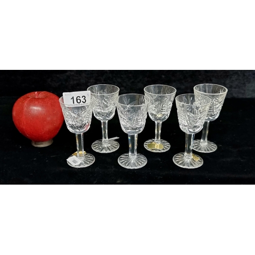 163 - A set of six neatly proportioned Waterford Crystal stemmed glasses in the Clare pattern. With acid m... 