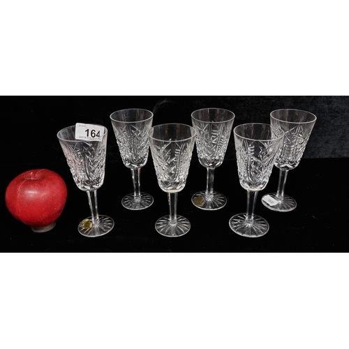 164 - Six stemmed Waterford Crystal glasses in the Clare pattern. With acid marks to base and in very good... 