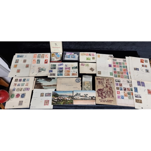 172 - A large collection of vintage and antique stamps including Irish, English and worldwide examples. Co... 