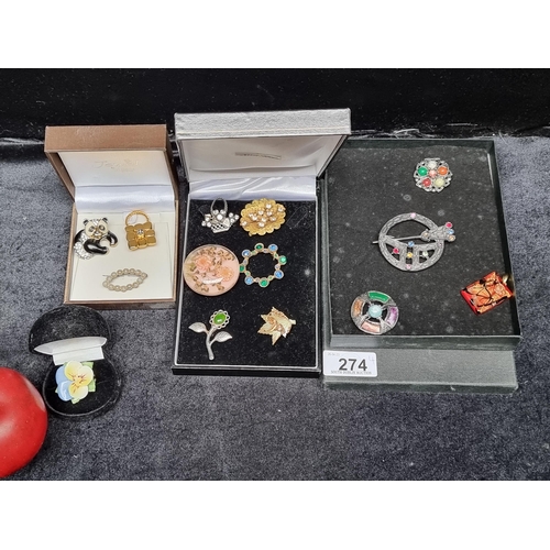 274 - A collection of 14 pretty   vintage brooches including vintage examples with colourful gems, floral ... 