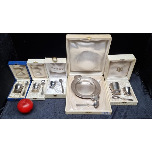 275 - Five boxes containing a variety of vintage silver plated, christening sets  including egg cup and sp... 