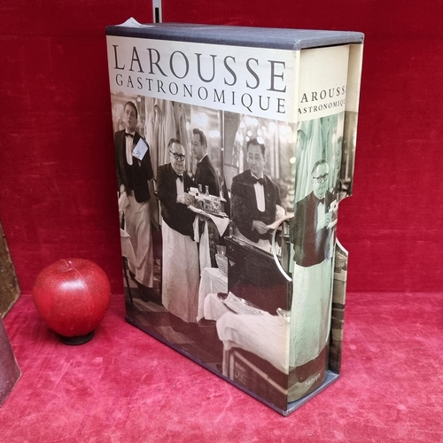 304 - A hardback cookery encyclopedia book titled 'Larousse Gastronomique'. With a hardback cover and orig... 