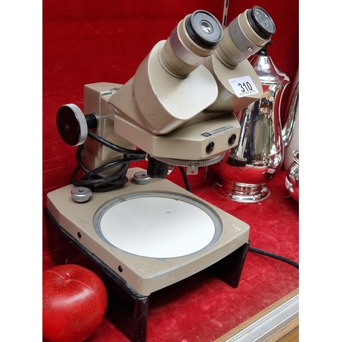 310 - A vintage Vickers Instruments binocular microscope with electric field illumination and two W.F. 5X ... 