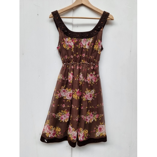 329 - A pretty Italian made A-line dress from Blugirl Blumarine made from 100% silk. With a rose floral pa... 