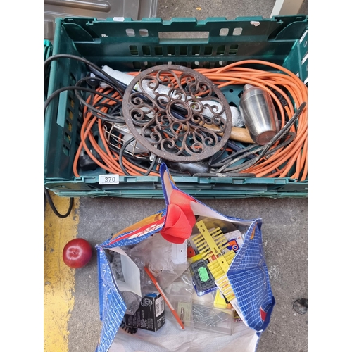 370 - A crate containing a varity of DIY and tool items including A mechanics light with long cable. Metal... 