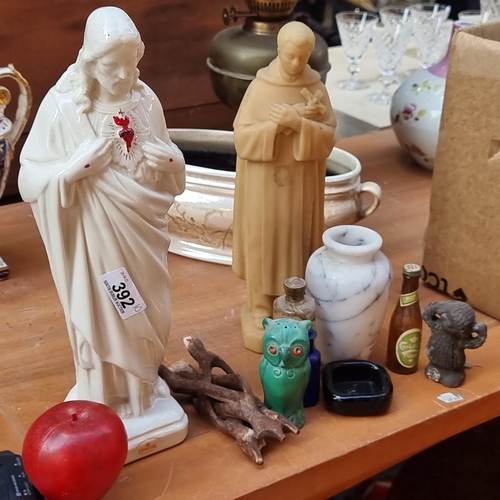 392 - A mixed lot of ten vintage and collectable items. Including a very striking porcelain figure of Jesu... 