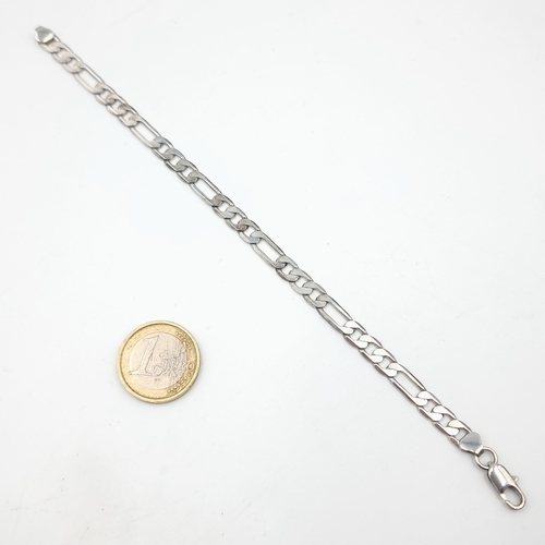 4 - A heavy gauge Curb-Link sterling silver bracelet. Length: 20cm. Weight of item: 8 grams.