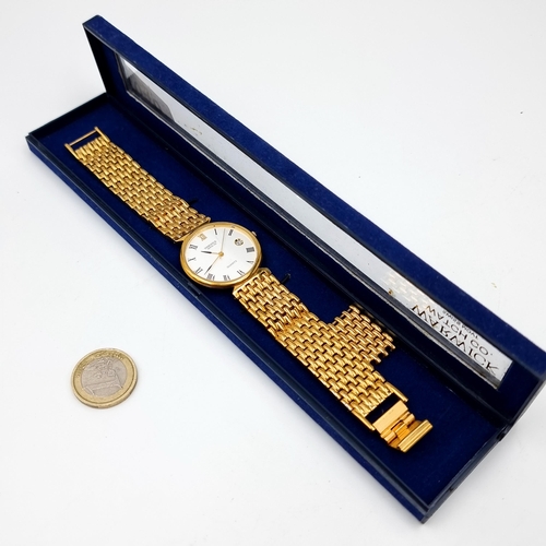 40 - A fabulous  Warwick Watch Company gold toned wrist watch, set with an enamelled white face, Roman nu... 