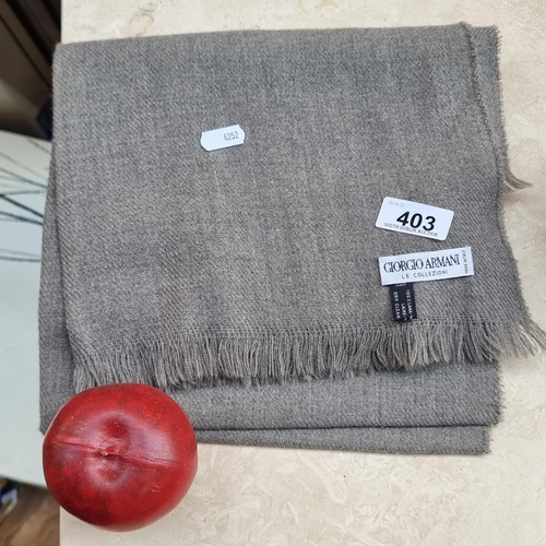 403 - A very handsome 100% wool scarf by the Italian designer Giorgio Armani in a warm grey tone. Looks as... 