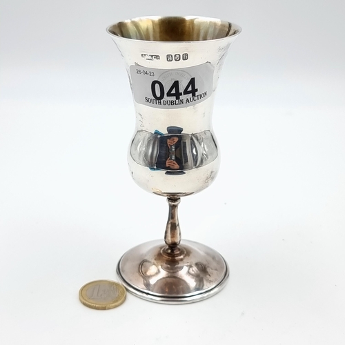 44 - A fine example of an antique Irish silver and gilt spirit cup, set beautifully with a tulip rim and ... 