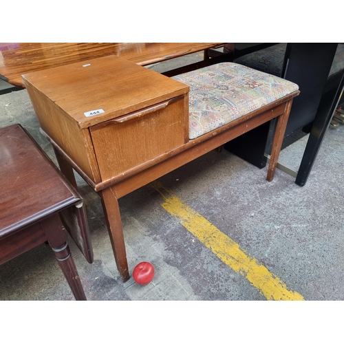 444 - A charming vintage Mid Century telephone table with one drawer to side and seat upholstered in a fun... 