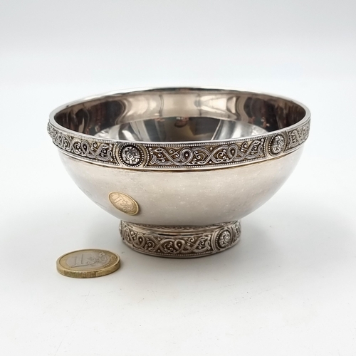 53 - Star Lot: A fabulous example of a heavy Irish silver graduated bowl, set with a circular base and fe... 