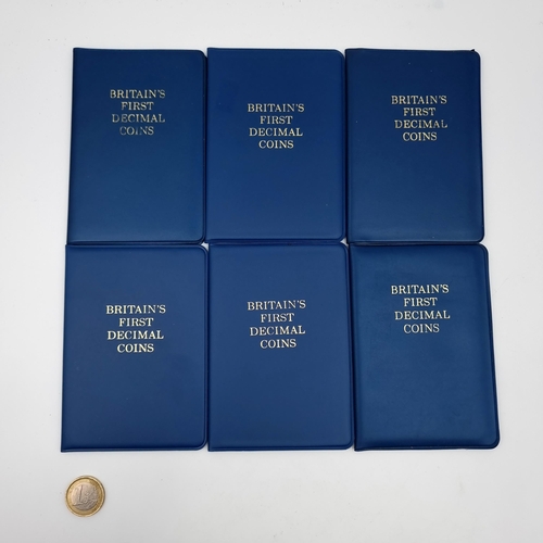 56 - A collection of six wallets, comprising of Britannia first decimal coins.