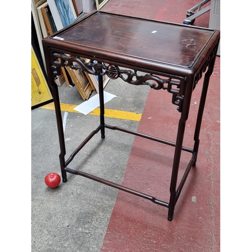 668 - A charming Chinese rosewood side table with delicate legs and hybrid animal and Chinese character ap... 