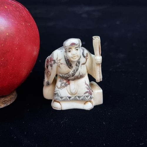 707 - A vintage carved netsuke depicting one of the three Star God figures. This example depicts the figur... 