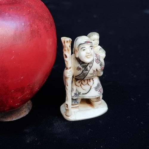 710 - A vintage carved netsuke depicting one of the three Star God figures. This example depicts the figur... 