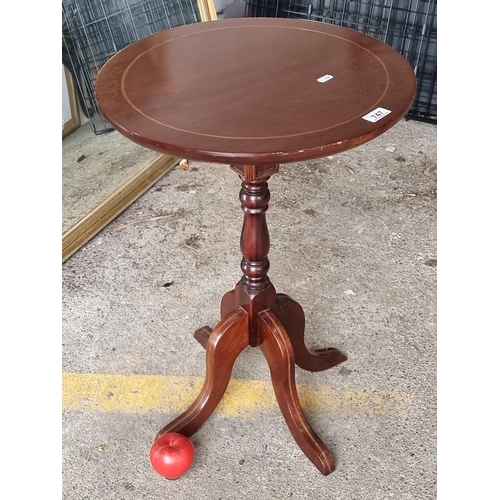 747 - A gorgeous antique table with circular top, turned stem and quadruple base - this handsome piece is ... 