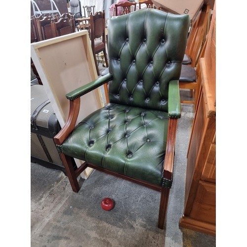 857 - Star Lot : A fabulous vintage Chesterfield style armchair with fluted wooden frame and wonderful but... 