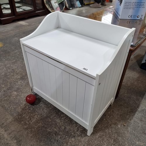 863 - A charming chest in a bright white finish. Features gallery back and hinged lid which opens to revea... 