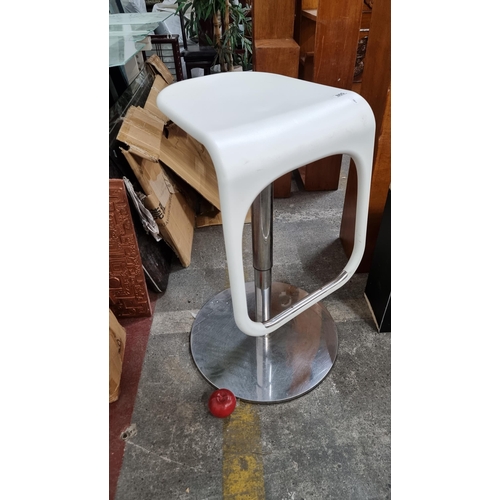 865 - A stylish Urban bar stool by IKEA with a white seat and footrest, held on a chrome stem and base.