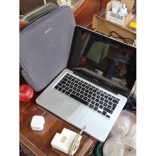 892 - A MacBook Pro laptop with a 13 inch screen, serial number: C1MLF614DTY3. Not tested and with sd to m... 