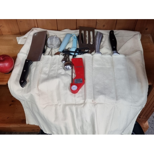 893 - A GenWare kitchen equipment wallet containing a selection of knives including a cleaver from Alpina ... 