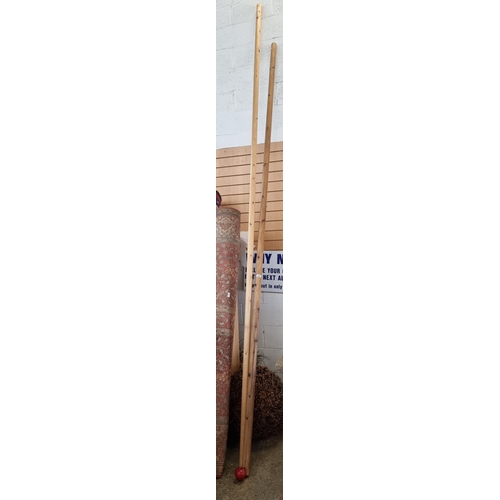 897 - Two very long sanded wooden poles (13ft and 12ft in length). These have one flattened side, Ideal fo... 