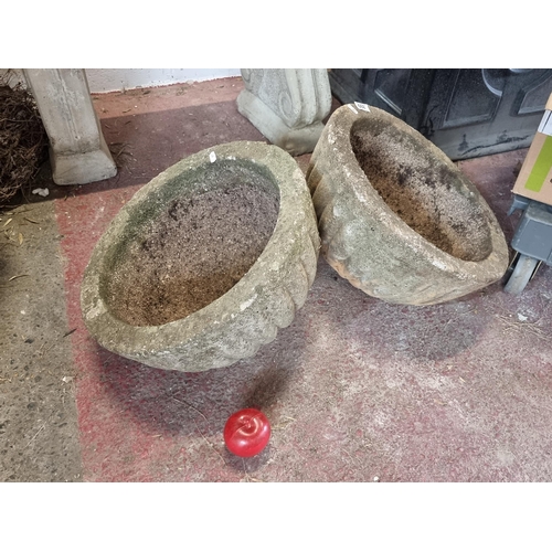 899 - A pair of remarkably heavy reconstituted stone garden planters. Great looking and high quality piece... 