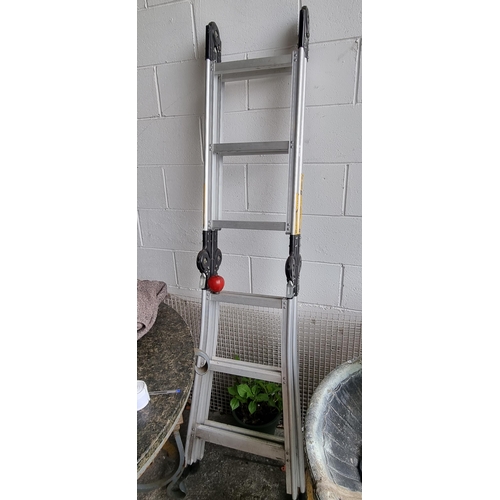 906 - A Pro-Step safety ladder with six treads.