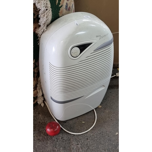 915 - An Ebac 2650E dehumidifier with various modes and a three pronged plug.