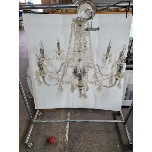 917 - Star Lot : A very ornate vintage eight branch chandelier with beaded droplet detailing throughout an... 